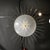 This striking modernist chandelier is a testament to the exquisite craftsmanship of the 21st-century Murano glassmaking....