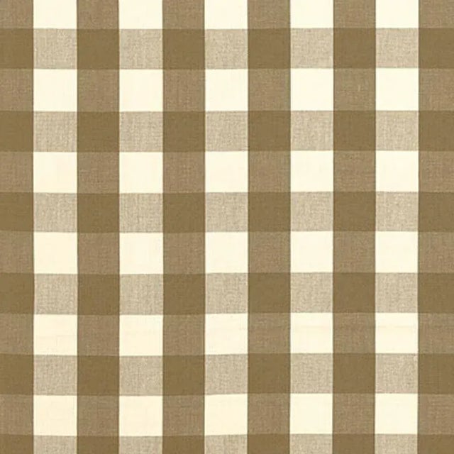 A classic one and a half-inch buffalo check, this woven cotton is a wonderful complement to both prints and plains. Sold...
