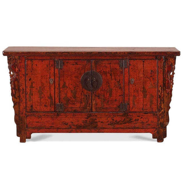 This lovely sideboard is from Gansu province in western China and is finished in a rich, red lacquer. It still features...