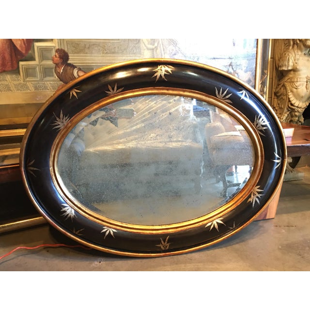 Chinoiserie Gold Bamboo Leaves on Convex Black Frame With Antiqued Oval Smoky Mirror For Sale - Image 9 of 9