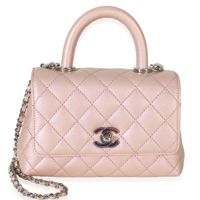 Intrinsically Chanel, the medium Coco top handle bag was named after the maison's founder. Introduced in 2015, the bag...