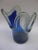 A large glass vase in 'splash' form with glass that fades from deep cobalt blue the base to clear at the top. Looks great...