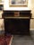 Circa 1825 English Mahogany Butler's Desk with Brass Hardware. Drop front writing surface with interior drawers and...