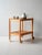 Simple pine wood structure with a removable tray and original metal casters. Scandinavian pine cart from the 1960s, with...