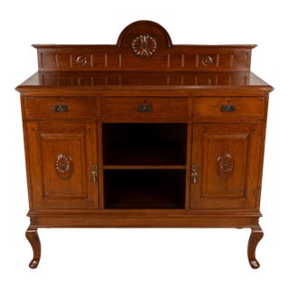 Early 20th Century English Edwardian Oak Sideboard Buffet Server Carved Sunflower Motif Cabinet For Sale