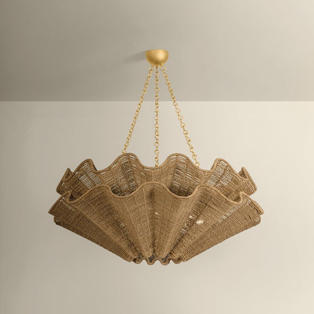Recalling the silhouette of a clamshell, the Hayworth chandelier puts an artisanal spin on coastal design. Two large...