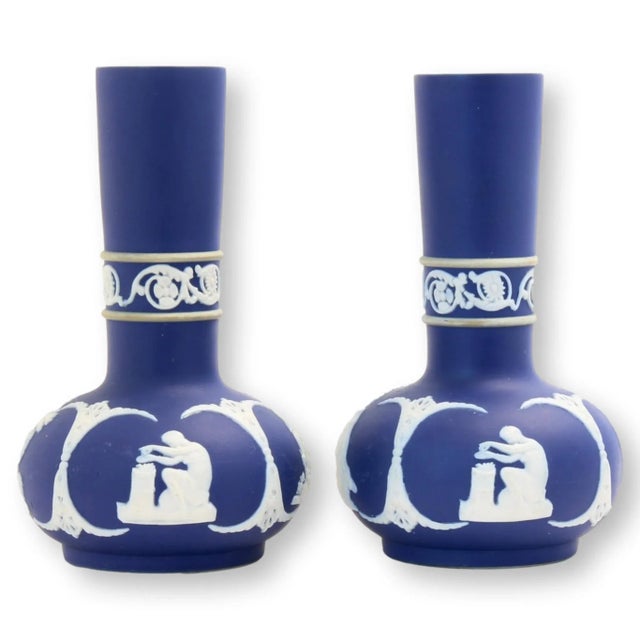 a Pair of English AdamsJasperware blue vases. Earlier Jasperware, as these are, are dip glazed, rather than the later...