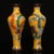 This is a striking and vibrant pair of matching cloisonné enamel vases. Featuring an elegant, elongated baluster form...