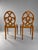 Swedish Grace Side Chairs in Birch with Sculptural Openwork Backs, 1920s An elegant pair of Swedish Grace side chairs from...