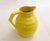 Large 1950s Art Deco style pitcher, with a bulbous, oval body featuring raised, ringed details and a stylized geometric...
