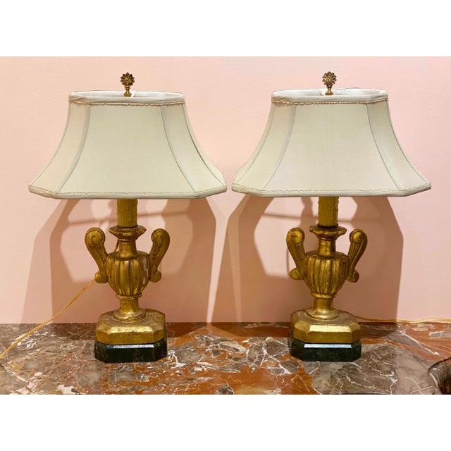 A pair of elegant antique Ports of Palmas as lamps. Beautifully crafted with intricate details and a unique finish these...