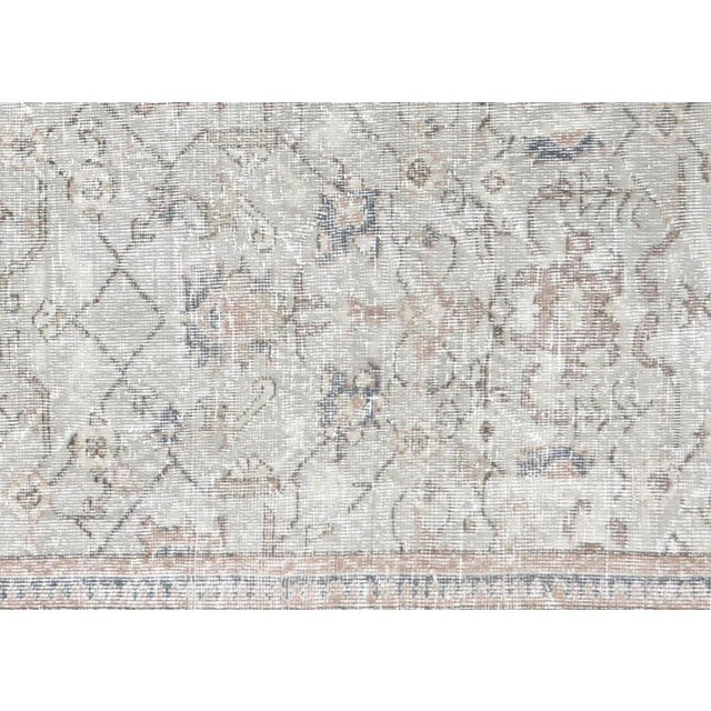 1960s Turkish Oushak Rug. Hand woven with wool on wool foundation in the Oushak region of Western Turkey. The Anatolian...