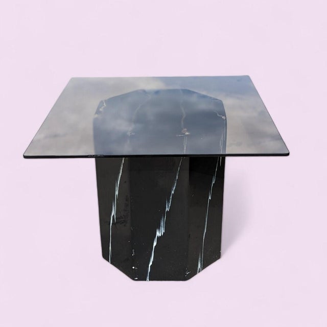 Bring timeless design into your home with this Postmodern side table in a dramatic faux marble finish. Design Highlights:...