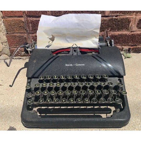 Antique 1945 Smith Corona Sterling Typewriter Use this typewriter as decor in your restaurant or coffee shop. It will...