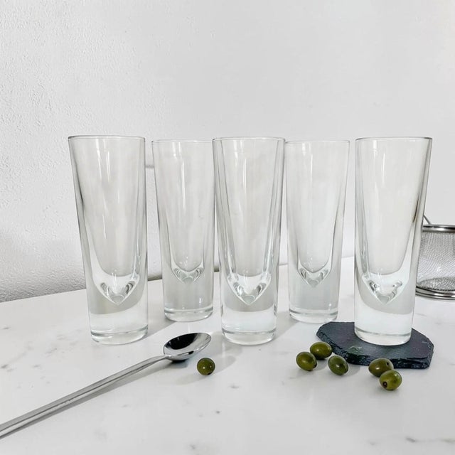 Elevate your drinking experience with the Carlo Moretti Bullet Highball Glasses, a stunning set of five that combines...