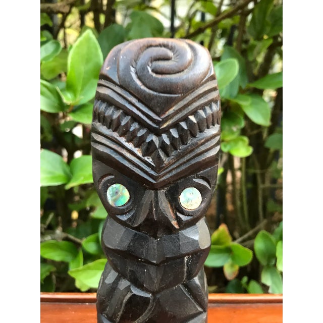 Vintage Midcentury South Pacific Māori Tiki Figure from New Zealand. Intricately hand carved in rich dark wood with...