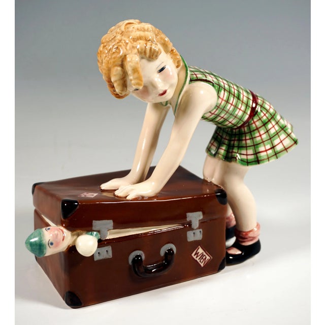 Very rare goldscheider art déco ceramic figurine of the 1930s: little blond, curly-haired girl in a green-red checkered...