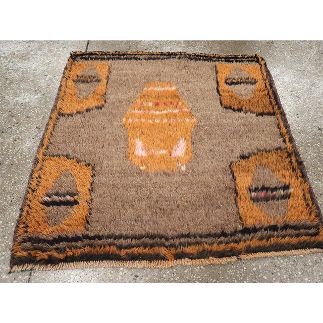 A vintage Turkish Konya carpet from the mid-20th century. Measures: 2' 8" x 2' 8"