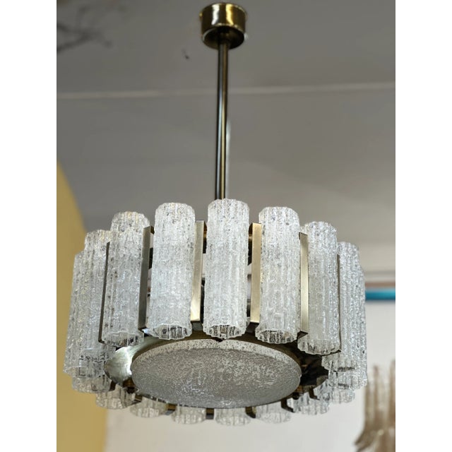 Mid-20th Century Barovier & Toso chandelier. Supporting structure in bronze-coloured chromed metal, a large glass plate...