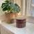 Experience the exquisite craftsmanship of the Burmese Yun Lacquer Betel Box, a stunning small round container that...