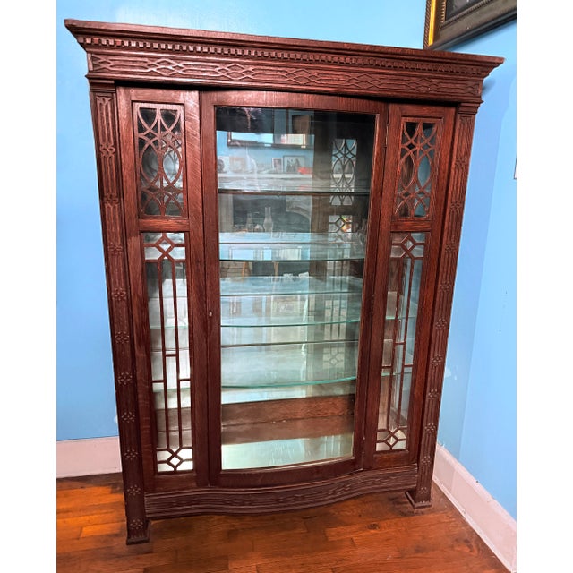 American Arts & Crafts/Mission style bookcase and display cabinet, circa 1900–1915, constructed from solid quarter-sawn...