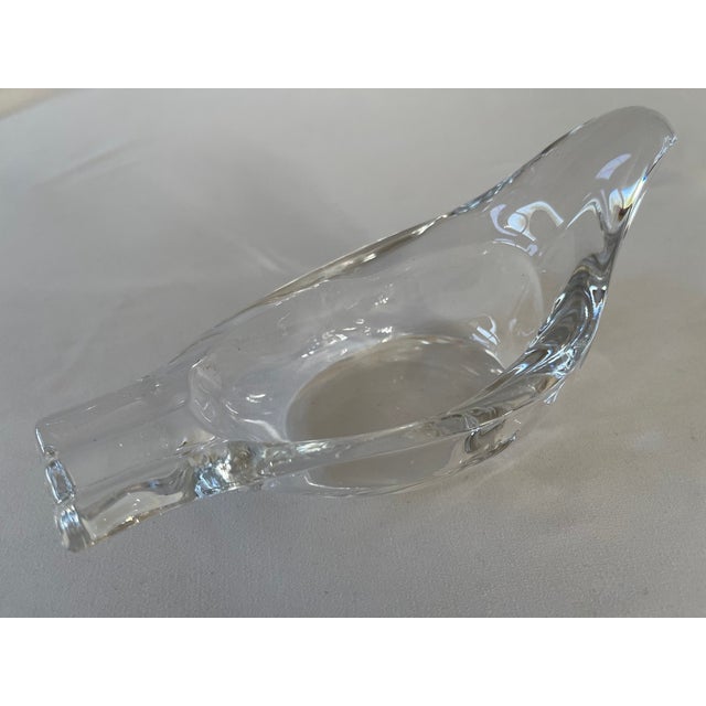 1960's French clear glass dove ashtray, with holders at tail end. Graceful piece to display as art glass when not in use....
