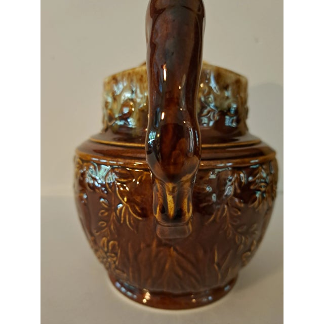 Burnt Umber Floral Pitcher With Dog Handle For Sale - Image 8 of 11