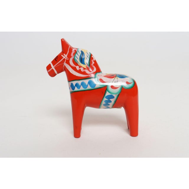 Mid-Century Scandinavian Modern Hand-Painted Dala Horse designed by Nils Olsson and handmade in a workshop in Färnäs...