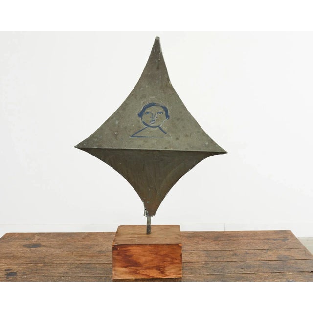 Fascinating objet d'art created and painted by artist Ira Yeager (American 1938-2022). Crafted from patinated zinc with an...