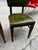 Up for consideration is a beautiful vintage collection of green leather gun lock style wooden dining chairs. This set...