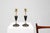 This pair of French Empire candlesticks from around 1870 exemplifies the refined neoclassical taste of the late 19th...