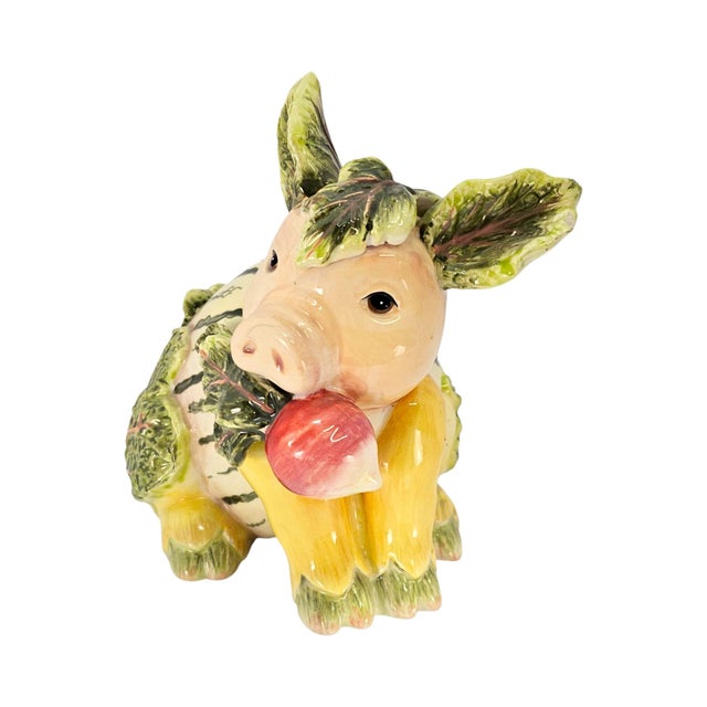A vintage Fitz and Floyd figural pig from the French Market collection, produced during the 1990s and modelled as a...