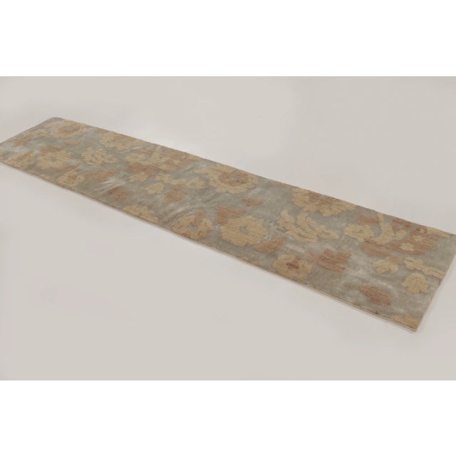 Hand-knotted in a blend of exotic yarns and natural silk, this 2x10 modern runner is a bold addition to Rug & Kilim’s...