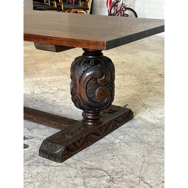 Featured in this listing is a stunning hand carved dining table made in Mexico circa 1960's. Significant in size, with...