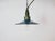 Industrial blue enamel pendant light made in Poland during the 1960s. White enamel inside the shade. Green cast aluminium...