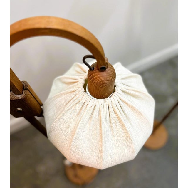 160cm high x 68cm wide x 68cm deep. Shade diameter 27cm. High quality teak standing lamp from the Danish manufacturer...