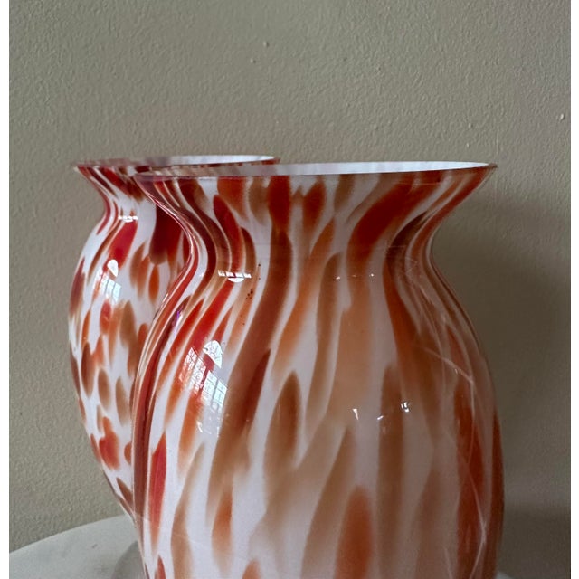 A vibrant expression of Mid-Century artistry, this pair of handblown vases captures the era’s bold use of color and...