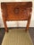 Set of four Neoclassical Chairs, France 19th century The slightly bent backrests are decorated with a rosette and...