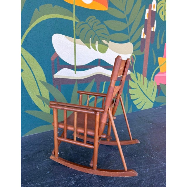 Great safari style Costa Rican rocking chair with embossed leather from a bygone era. Rocks well and is in great condition...