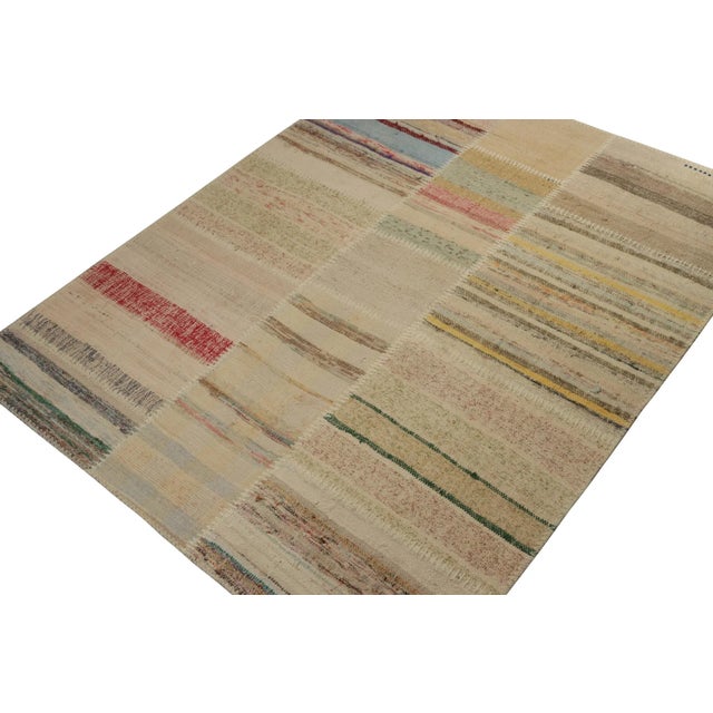 Handwoven in wool, Rug & Kilim presents a 4x5 contemporary rug from their innovative new patchwork kilim collection. On...