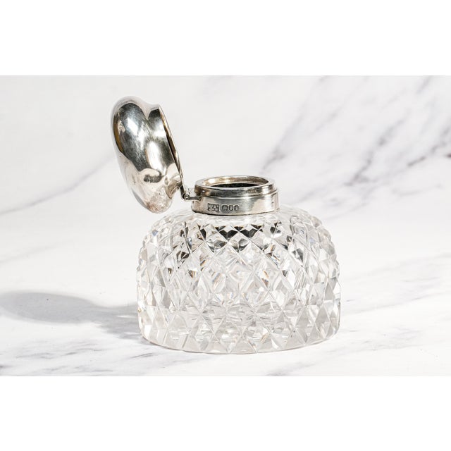 A handsome and substantial example of fine Edwardian English deskware, this impressive antique inkwell was produced in...