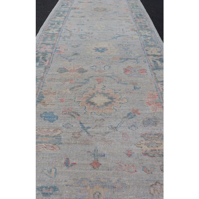 Textile Hand Knotted Modern Oushak Runner on Light Gray Field and Colorful Motifs For Sale - Image 7 of 11