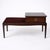 A stylish mid-century mahogany telephone bench by Stag Furniture, combining elegant British design with practical hallway...