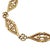 French Art Nouveau 18K yellow gold bracelet featuring a series of intricately designed openwork links, each with a...