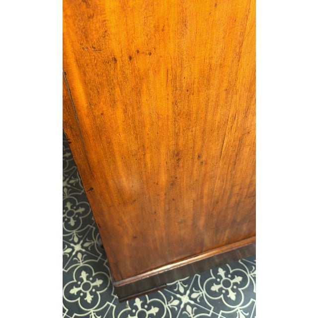 Antique Mahogany Lift-Top Campaign Style Chest of Drawers. This exceptional antique mahogany lift-top chest of drawers...