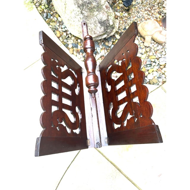 Auburn Antique Mahogany, Double-Sided, Rotating Magazine/Book/Sheet Music Carrier, With Intricately Carved Fretwork Panels, Turned Handle and a Tripod Column For Sale - Image 8 of 12