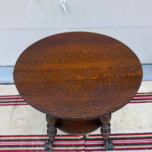 Antique Quartersawn Oak Round Tabouret Table with Glass Ball & Claw Feet A handsome Victorian oak parlor table — often...