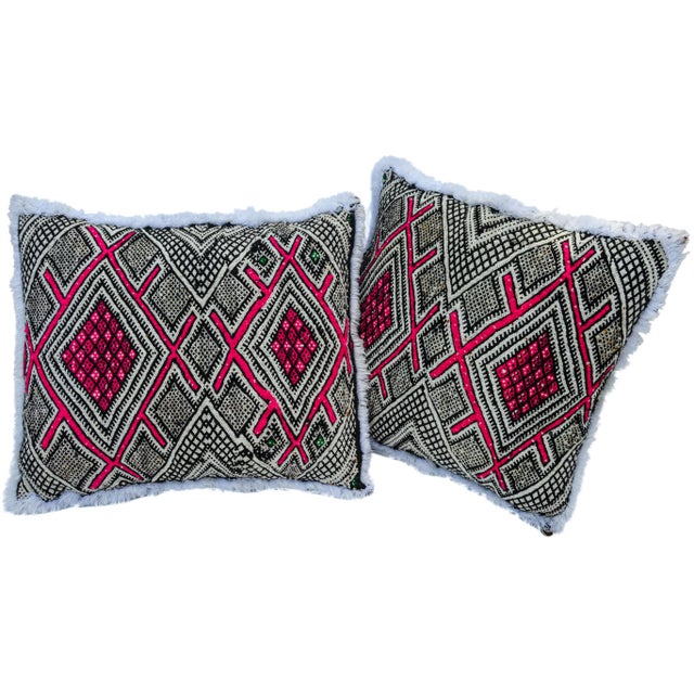 Pair of Moroccan pillows handwoven by the Berbers of the High Atlas Mountains. Featuring ornate display of diamond...