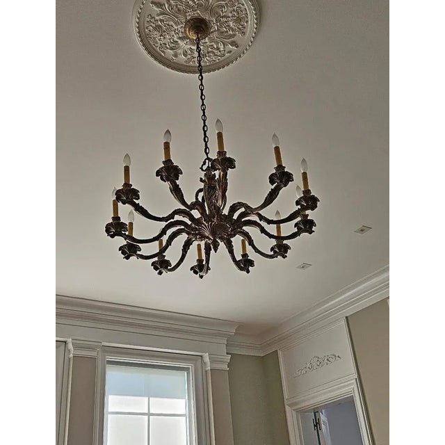 Louis 16th Style Bronze Chandelier sold as found in working condition previously owned and used.
