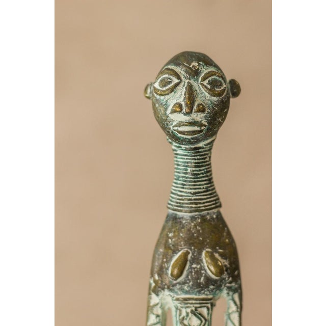 Benin bronze objects, were used in West Africa as a form of currency and thus status. Their value lies in both the metal...